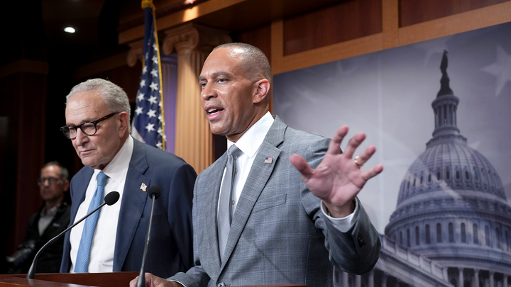 Senate Minority Leader Chuck Schumer, D-N.Y., and House Minority Leader Hakeem Jeffries, D-N.Y., right, talk with reporters following their meeting with President Donald Trump and Republican leaders on the government funding crisis, at the Capitol in Washington, Sept. 29, 2025. (J. Scott Applewhite/AP Photo)