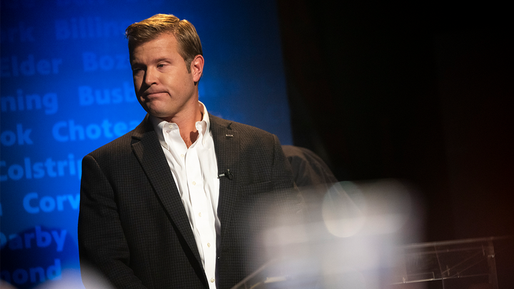 Tim Sheehy prepares to debate U.S. Sen. Jon Tester on campus at the University of Montana in Missoula, Mont. Sheehy eventually beat Tester in the subsequent election to take over his Montana Senate seat. (The Missoulian via AP)