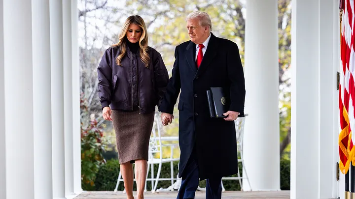 President Donald Trump, right, and First Lady Melania Trump arrive for the National Thanksgiving Turkey pardon ceremony in the Rose Garden of the White House in Washington, D.C., on Nov. 25, 2025. (Jim Lo Scalzo/EPA/Bloomberg via Getty Images)