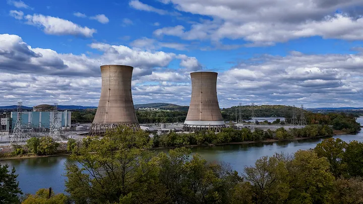 Microsoft is reopening the shuttered Three Mile Island nuclear power plant to help meet rising energy demand due to AI data centers. (Heather Khalifa/Bloomberg via Getty Images)