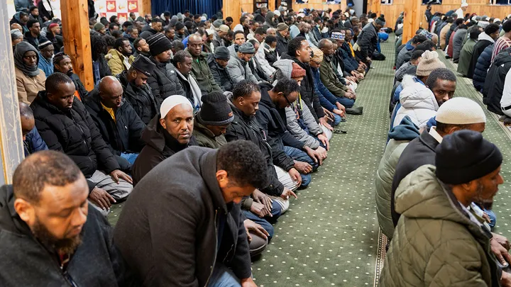 Men take part in a weekly Friday Jum&rsquo;ah prayer session at Abubakar As-Saddique Islamic Center amid a reported ongoing federal immigration operation targeting the Somali community in Minneapolis, Minnesota, U.S. Dec. 5, 2025.   (Tim Evans/Reuters)