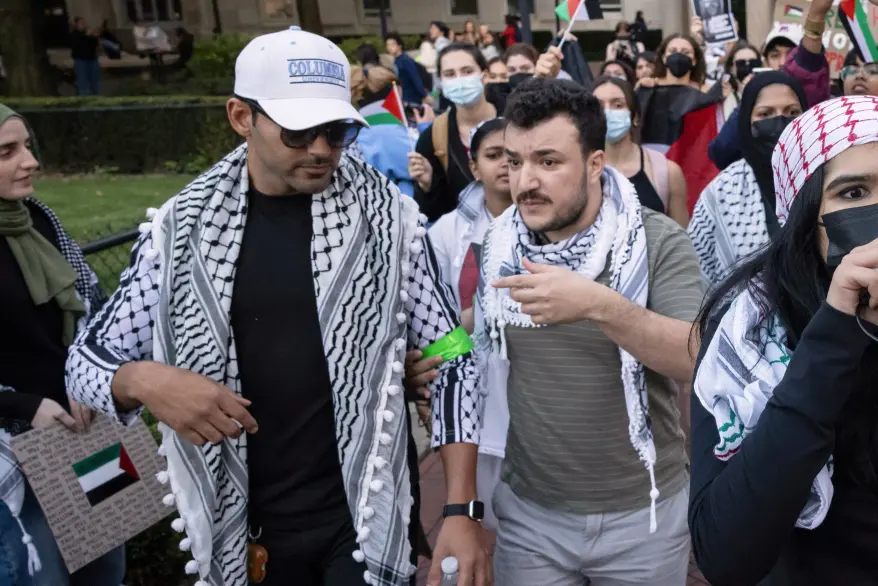 Mohsen Mahdawi (left) and Mahmoud Khalil participate in a pro-Palestinian protest at Columbia University, Thursday, Oct. 12, 2023, in New York. AP