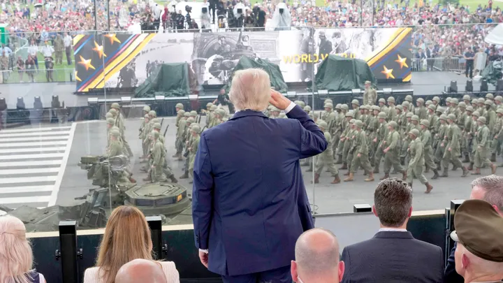 President Donald Trump announced U.S. service members will receive "warrior dividends" in honor of the 250th anniversary of the nation's founding. (Doug Mills/The New York Times/AP)