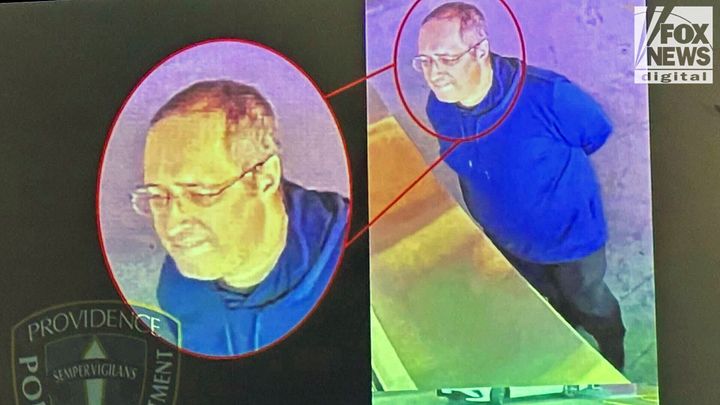 Images of Claudio Manuel Neves-Valente are displayed on a projector screen at a news briefing in Providence, Rhode Island. The 48-year-old former student and Portuguese national has been identified as the gunman behind a mass shooting that killed two students and wounded nine Saturday. (Andrea Margolis/Fox News Digital)