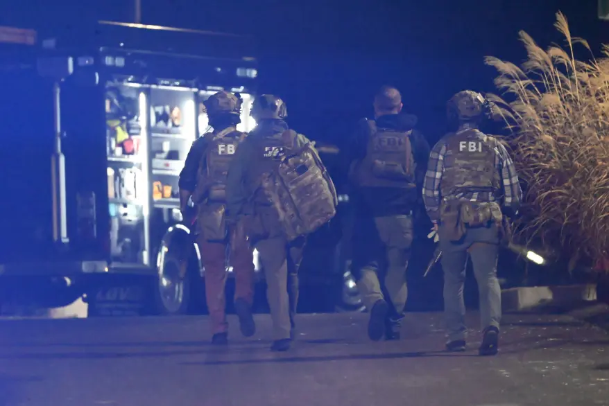 FBI Evidence Response Team agents at the Extra Space Storage in Salem, New Hampshire, on Dec. 18, 2025. Kyle Mazza/Shutterstock
