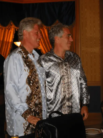 Clinton and Epstein seen in an undated photo at an unknown location that was released by the DOJ on Dec. 19, 2025. ZUMAPRESS.com