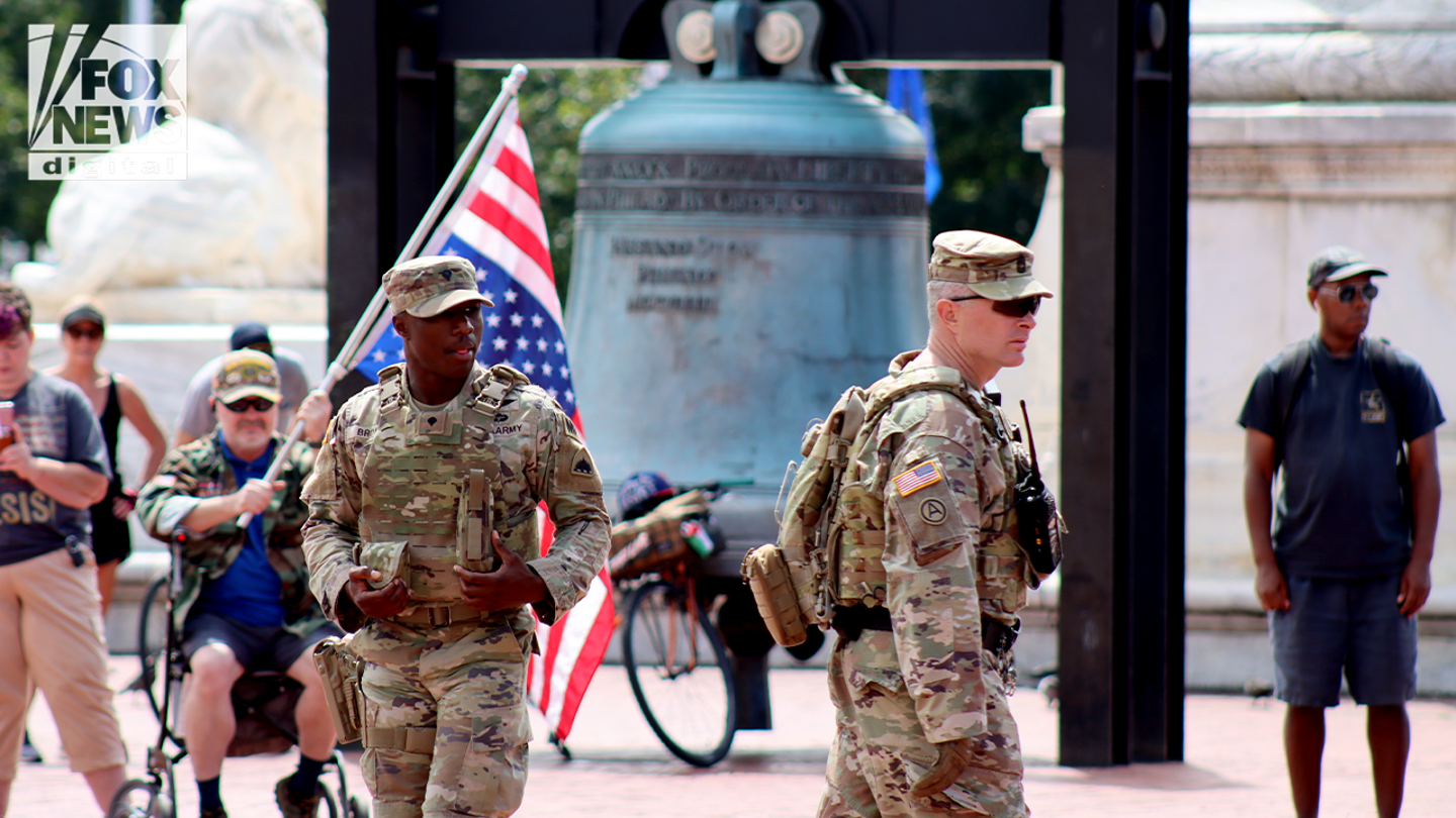 National Guard members stand among protesters at Union Station in Washington, D.C. (Fox News Digital/Emma Woodhead)