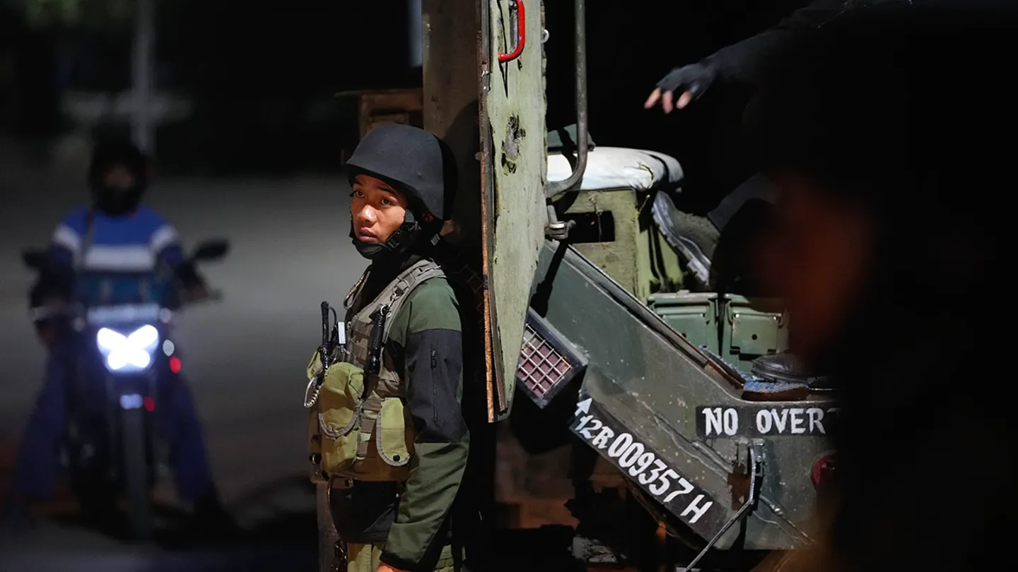 Indian army officers stand guard near Pahalgam in south Kashmir after assailants indiscriminately opened fire at tourists visiting Pahalgam, Indian-controlled Kashmir, Tuesday, April 22, 2025. (Dar Yasin/AP Photo)