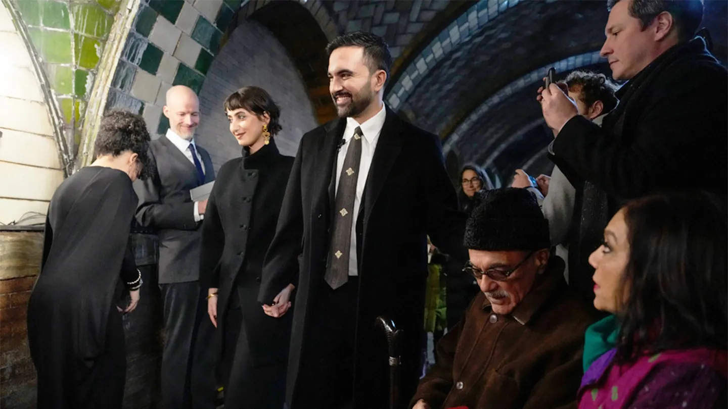 Mayor-elect Zohran Mamdani, center, arrives with his wife Rama Duwaji for a swearing-in ceremony, Wednesday, Dec. 31, 2025, in New York. (AP Photo/Yuki Iwamura)