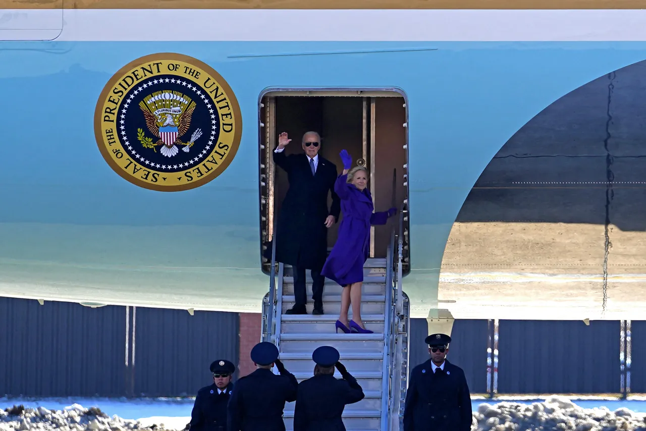 US former President Joe Biden and former First Lady Jill Biden wave as they board Air Force One at Joint Base Andrews, Maryland, during a farewell ceremony on January 20, 2025, following Donald Trump’s inauguration. (Photo by ALLISON ROBBERT/AFP via Getty Images)