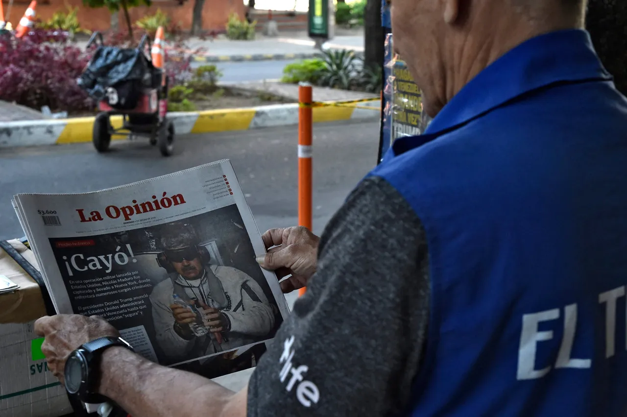 A man looks at the front page of a newspaper reading &ldquo;He fell&rdquo; and depicting Venezuela&rsquo;s ousted president Nicolas Maduro in Cucuta, Colombia, on the border with Venezuela, on January 4, 2026, a day after a US strike. (Photo by Schneyder Mendoza / AFP via Getty Images)