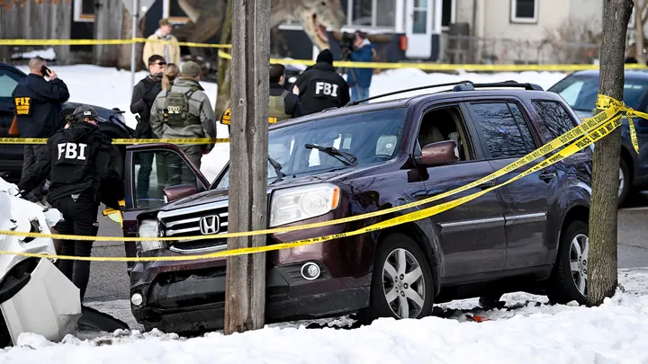 Members of law enforcement work the scene following a suspected shooting by an ICE agent during federal operations on January 7, 2026, in Minneapolis, Minnesota. (Stephen Maturen/Getty)