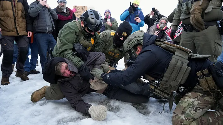 Border Patrol federal agents detain a demonstrator at a protest over the fatal shooting of Renee Nicole Good by a U.S. Immigration and Customs Enforcement agent during a rally outside the Whipple Building in Minneapolis Jan. 8, 2026. (Tim Evans/Reuters)