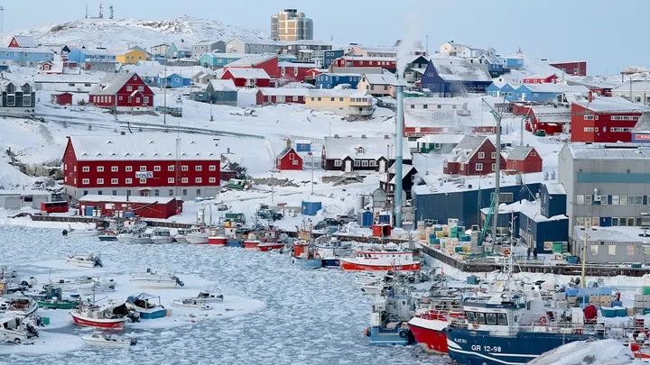 Ice covers the water in the harbor in Ilulissat, Greenland, on March 8, 2025. (Joe Raedle/Getty)