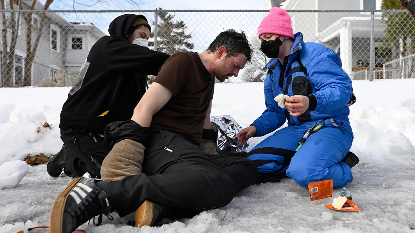 A man receives medical treatment after being exposed to a chemical irritant during federal law enforcement operations on Jan. 7, 2026, in Minneapolis, Minnesota. (Stephen Maturen/Getty)