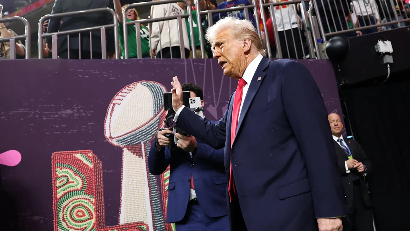 President Donald Trump walks onto the field before the 2025 Super Bowl. (Jamie Squire/Getty Images)
