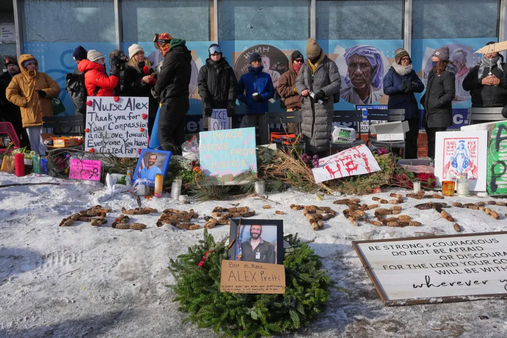 A memorial to Pretti near the scene where he was fatally shot by a federal agent on Jan. 25, 2026. AP Photo/Adam Gray