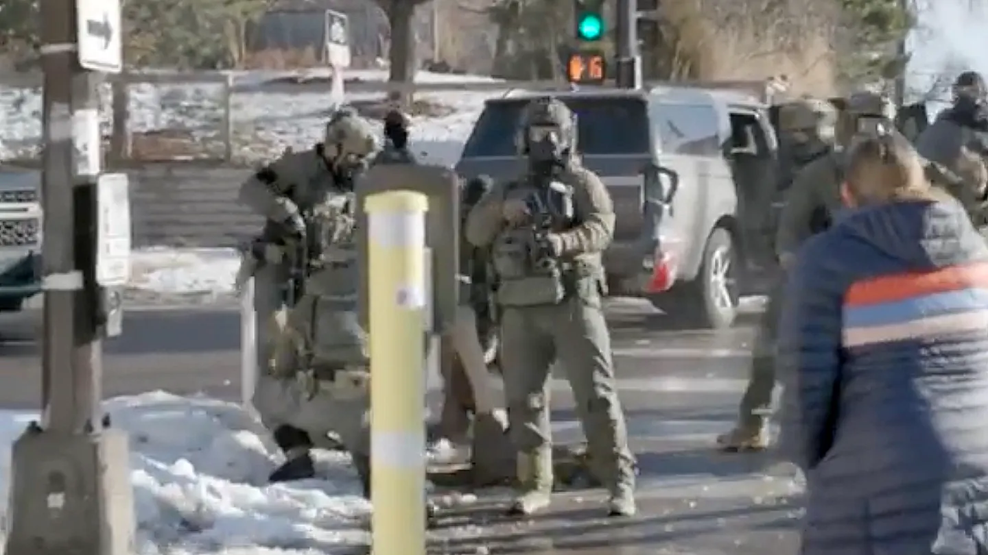 Video appears to show Alex Pretti kicking in the taillight of a federal vehicle before he's taken down by federal agents and released. (The News Movement)