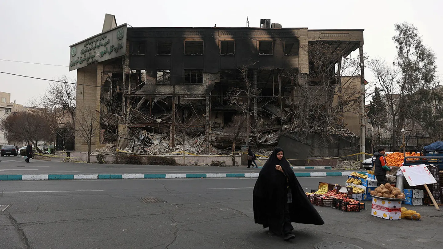 The state tax building burned during Iran's protests on a street in Tehran, Iran, Jan. 19, 2026.  (Majid Asgaripour/WANA via Reuters)