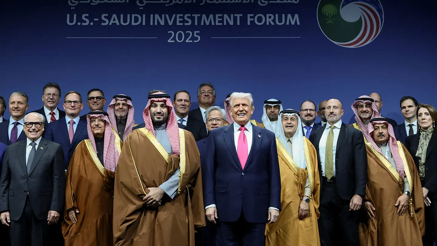 President Donald Trump poses for a picture with Saudi Crown Prince and Prime Minister Mohammed bin Salman and other attendees during the U.S.-Saudi Investment Forum in Washington, D.C., Nov. 19, 2025.  (Evelyn Hockstein/Reuters)