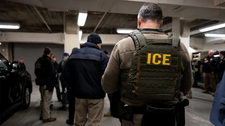 Immigration and Customs Enforcement agents, along with other federal law enforcement agencies, attend a pre-enforcement meeting in Chicago Jan. 26, 2025. (Getty Images)