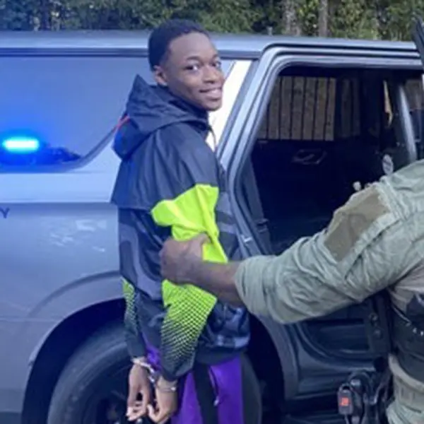 Kendrick wore a menacing smirk while he was hauled away after being on the run for over a week. Spalding County Sheriff