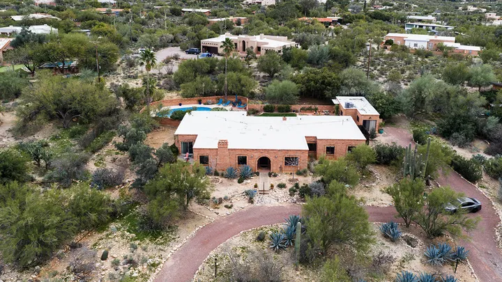 The home of Nancy Guthrie, the missing mother of "Today" show host Savannah Guthrie, is seen from above Feb. 5, 2026, in Tucson, Ariz. (Caitlin O'Hara/AP Photo)