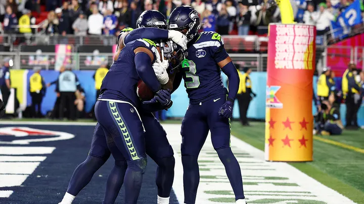 Seattle Seahawks linebacker Uchenna Nwosu (7) celebrates with teammate Nick Emmanwori (3) after scoring a touchdown in the fourth quarter of Super Bowl LX against the New England Patriots at Levi&rsquo;s Stadium in Santa Clara, California, on Feb. 8, 2026. (Ronald Martinez/Getty Images)