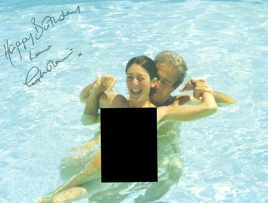 Former President Bill Clinton in a hot tub with a blurred out figure. 6 Former President Bill Clinton in a photo with a mystery woman included in the Epstein files. DOJ
