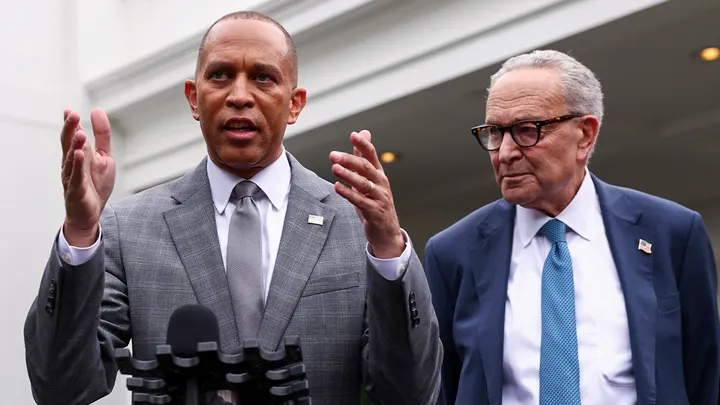 House Minority Leader Hakeem Jeffries, D-N.Y., speaks to the media next to Senate Minority Leader Chuck Schumer, D-N.Y., at the White House in Washington, Sept. 29, 2025.  (Kevin Lamarque/Reuters)