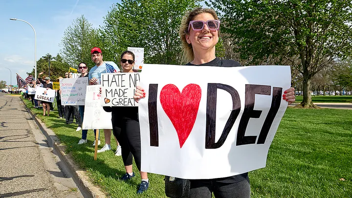 Protesters are seen outside a rally held by President Donald Trump at Macomb County Community College in Warren, Michigan. (Getty Images/Dominic Gwinn)