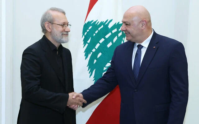 In this handout picture released by the Lebanese presidency, Lebanon’s President Joseph Aoun (R) meets with Iran’s head of the National Security Council Ali Larijani and a delegation at the Presidential Palace in Baabda on August 13, 2025. (Photo by Lebanese Presidency / AFP)
