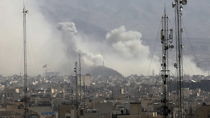 TEHRAN, IRAN - FEBRUARY 28: Smoke rises over the city center after an Israeli army launches 2nd wave of airstrikes on Iran on Feb. 28, 2026.  (Fatemeh Bahrami/Anadolu via Getty Images)