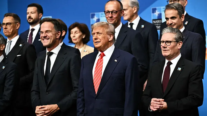 NATO Secretary General Mark Rutte, U.S. President Donald Trump and Britain's Prime Minister Keir Starmer pose with NATO country leaders for a family photo during the North Atlantic Treaty Organization (NATO) Heads of State and Government summit in The Hague, Netherlands, June 25, 2025.  (Ben Stansall/Pool via Reuters)