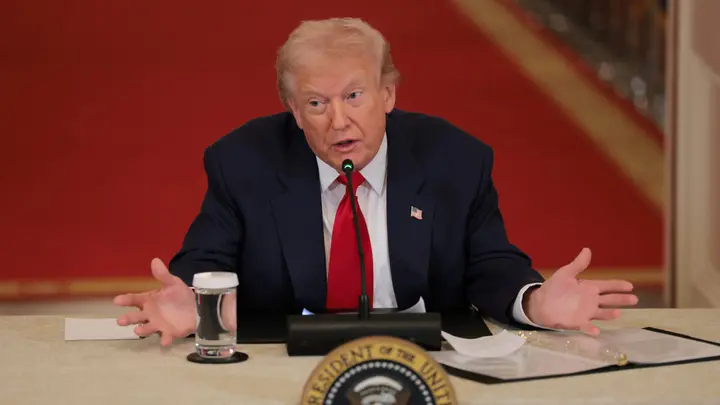 President Donald Trump speaks during a roundtable discussion on college sports in the East Room of the White House Friday. (Anna Moneymaker/Getty Images)