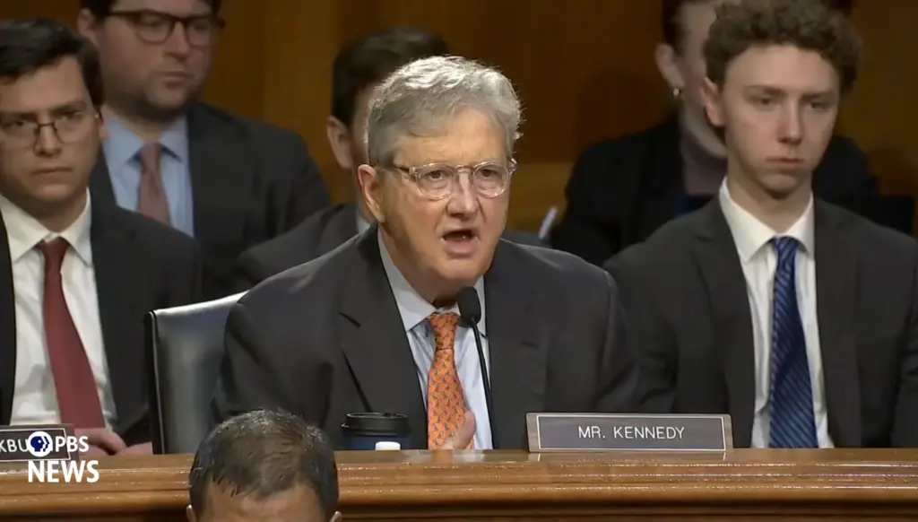 Sen. John Kennedy grills DHS Secretary Kristi Noem on Capitol Hill on March 3, 2026. PBS News