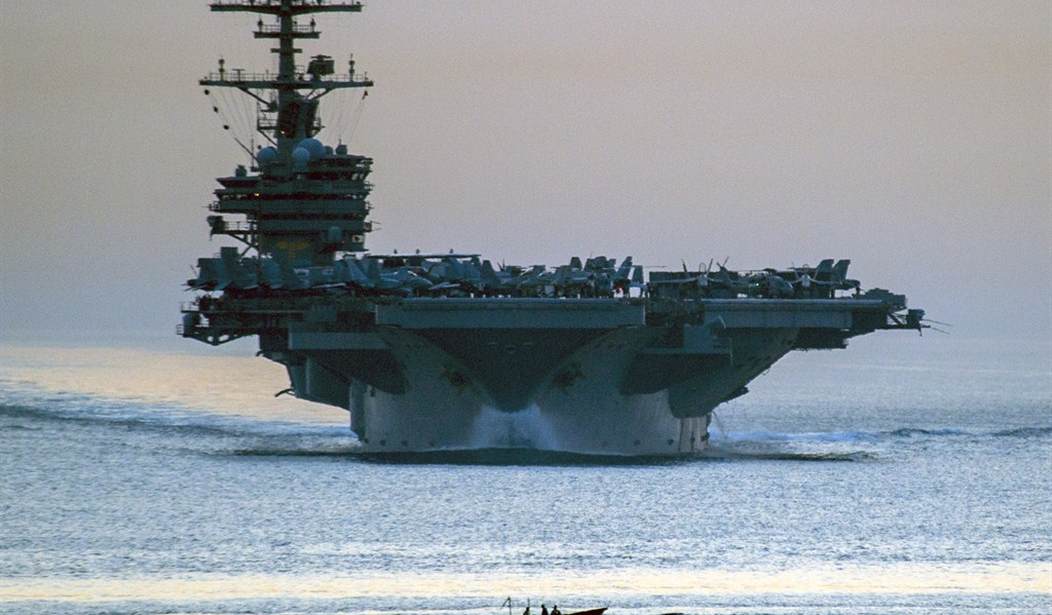 U.S. FLEXES NAVAL POWER AS THIRD AIRCRAFT CARRIER STRIKE GROUP MAY HEAD TO MIDDLE EAST