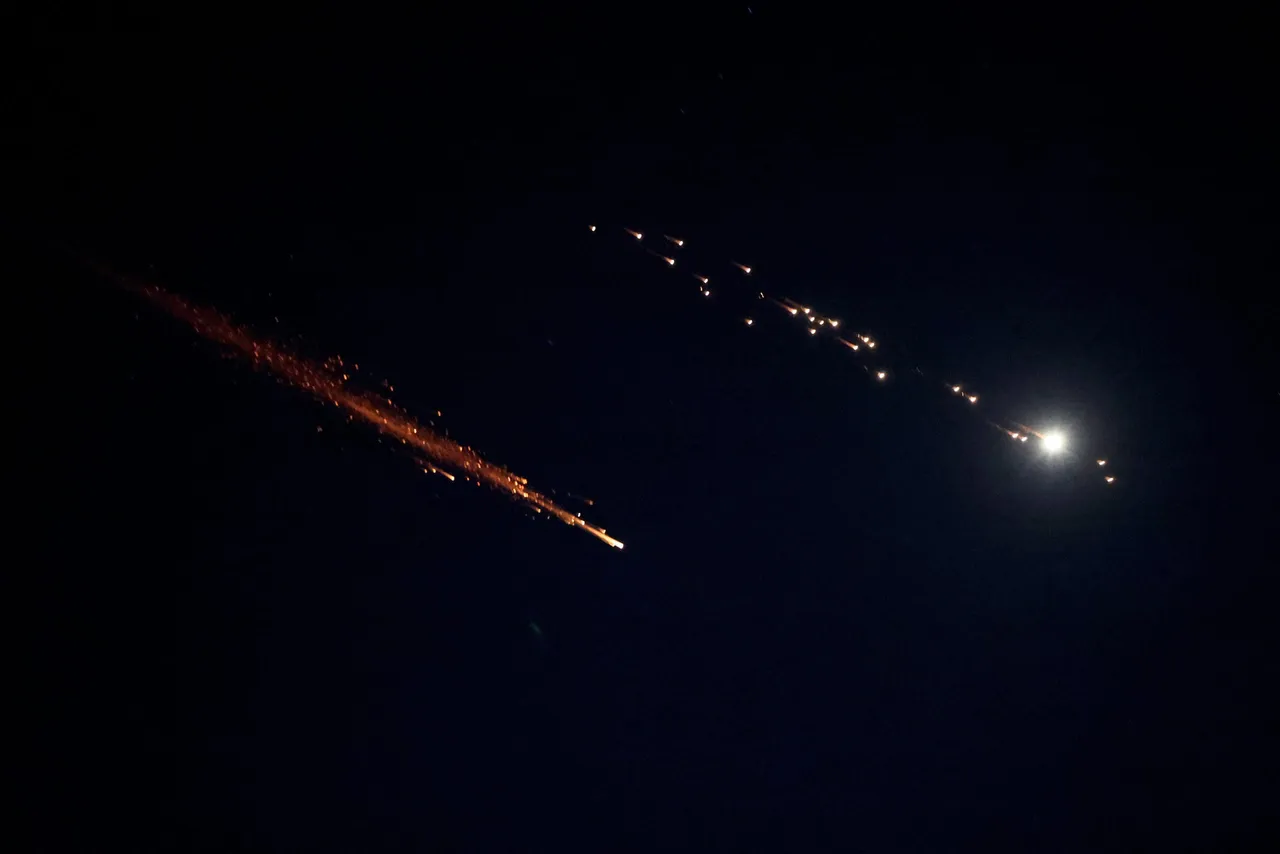 Rocket trails are seen in the sky above the Israeli center coastal city of Netanya amid a fresh barrage of Iranian missile attacks on March 9, 2026. (Photo by JACK GUEZ / AFP via Getty Images)