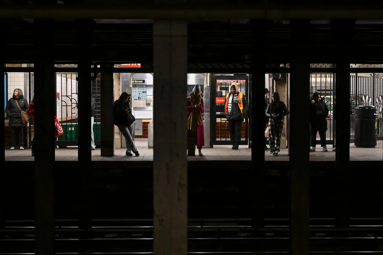 People stand on a subway platform in New York City on February 4, 2025. Joseph Lynskey was quietly waiting for a New York subway train on New Year&rsquo;s Eve when he was pushed from behind onto the tracks as a train pulled into the station. (Photo by ANGELA WEISS/AFP via Getty Images)