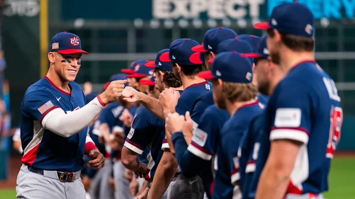 Aaron Judge of the United States shakes hands with teammates before a game against Canada during the 2026 World Baseball Classic at Daikin Park March 13, 2026, in Houston, Texas. (Houston Astros/Getty Images)