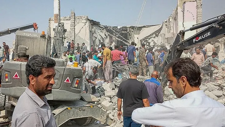 This picture obtained from Iran's ISNA news agency shows the site of a strike on a girls' school in Minab, in Iran's southern Hormozgan province, on Feb. 28, 2026. (Ali Najafi/ISNA/AFP via Getty Images)