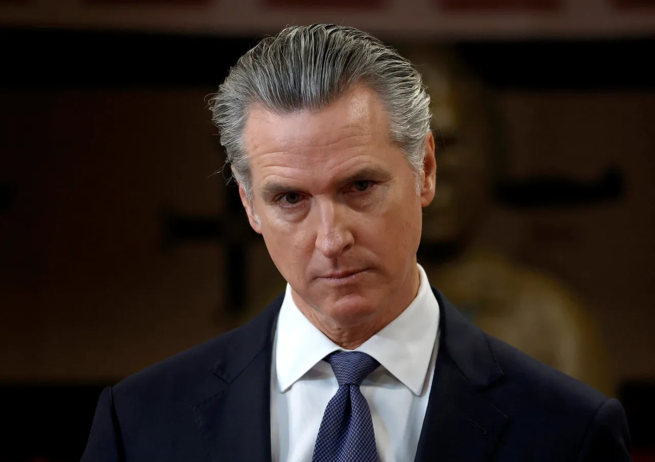California Gov. Gavin Newsom looks on during a press conference. (Photo by Justin Sullivan/Getty Images)