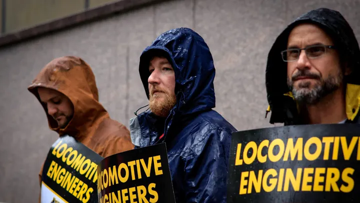 Members of the Brotherhood of Locomotive Engineers and Trainmen take part in a strike outside New Jersey Transit's headquarters on May 16, 2025, in Newark. (Kena Betancur/Getty Images)