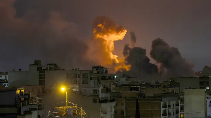 A large plume of smoke rises over Tehran, Iran, after explosions were reported in the city during the night on March 28, 2026. (Getty Images)