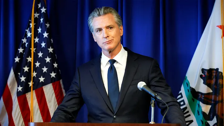 California Gov. Gavin Newsom takes questions from the media after announcing the state is suing the White House to restore SNAP funding before the cutoff during a news conference in Sacramento, California. (Fred Greaves/Reuters)