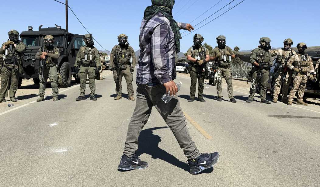 Federal Agents Raid Home of Anti-ICE Activist Linked to California Farm Violence
