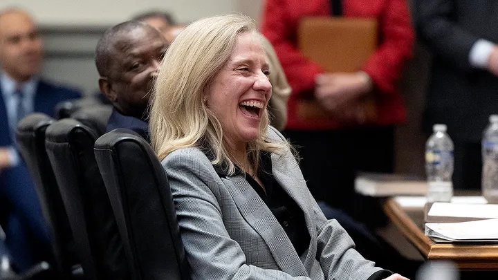 Virginia Gov. Abigail Davis Spanberger laughs during a ceremony in a court in Richmond, Virginia. (Mike Kropf-Pool/Getty Images)