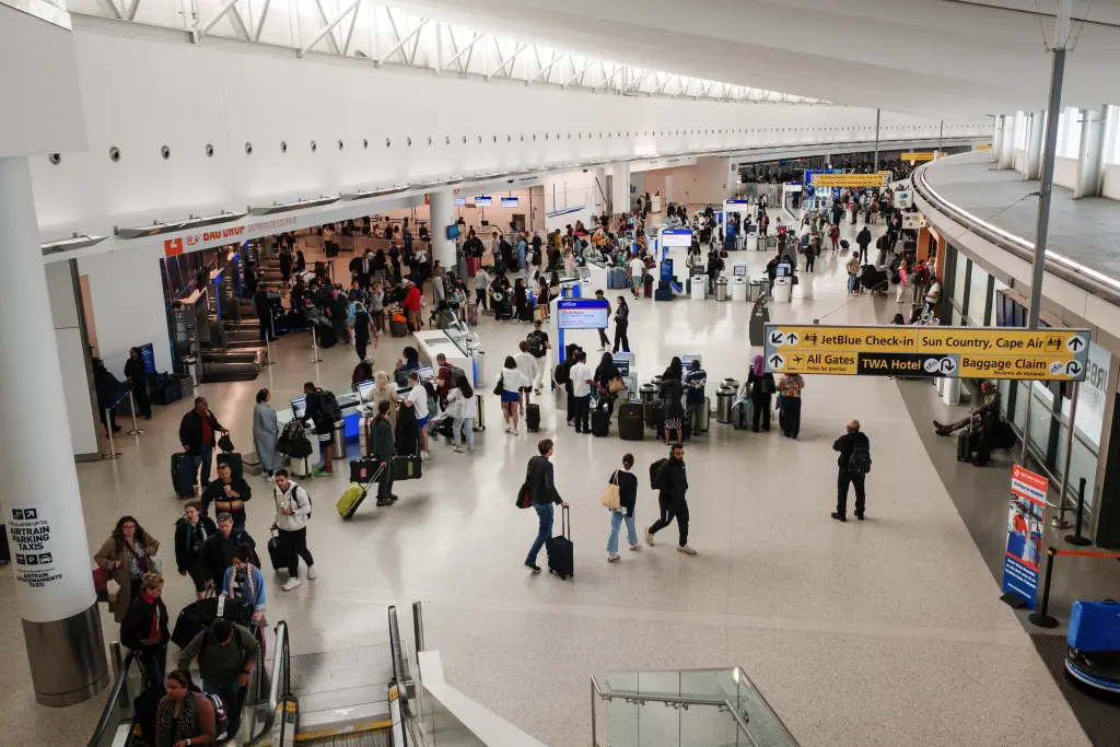 Passengers arrive at JFK Airport on May 22, 2026. Bloomberg via Getty Images