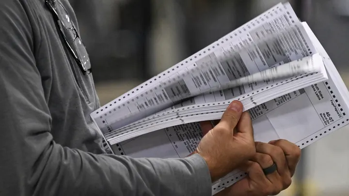 Poll workers process ballots at an elections warehouse outside of Philadelphia, Pennsylvania, on Nov. 8, 2022.  (Ed Jones AFP via Getty Images)