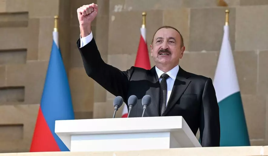 n this photo provided by Azerbaijan&rsquo;s Presidential Press Service, Azerbaijan President Ilham Aliyev gestures during a military parade in Baku, on Saturday, Nov. 8, 2025, while celebrating the fifth anniversary of the victory in the Nagorno-Karabakh war after Azerbaijan gained &hellip;